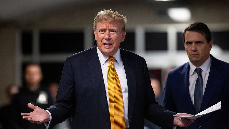 <div class="paragraphs"><p>Former US President Donald Trump talks to the press while standing with his attorney Todd Blanche at the end of the day at his criminal trial at New York State Supreme Court in New York City.</p></div>
