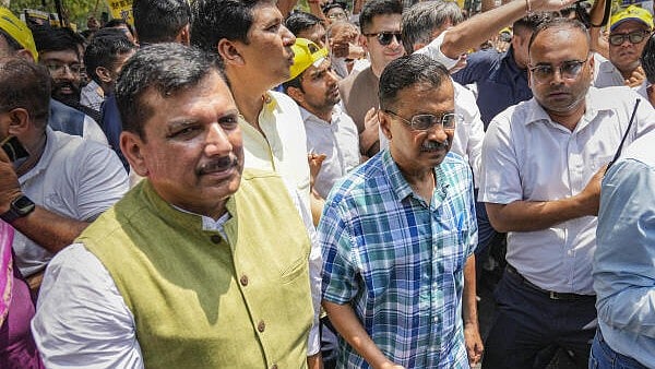 <div class="paragraphs"><p>Delhi CM and AAP convenor Arvind Kejriwal and party MP Sanjay Singh during a protest march, in New Delhi, Sunday, May 19, 2024.</p></div>