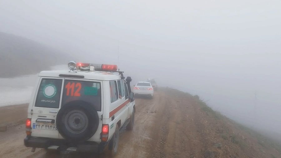 <div class="paragraphs"><p>An ambulance and other vehicles drive on a foggy road following a crash of a helicopter carrying Iran's President Ebrahim Raisi, in Varzaqan , East Azerbaijan Province, Iran, May 19, 2024 in this screen grab from a video. </p></div>