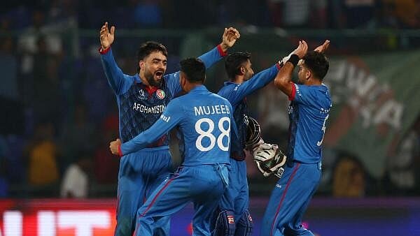 <div class="paragraphs"><p>Afghanistan cricket team celebrate victory after win.</p></div>