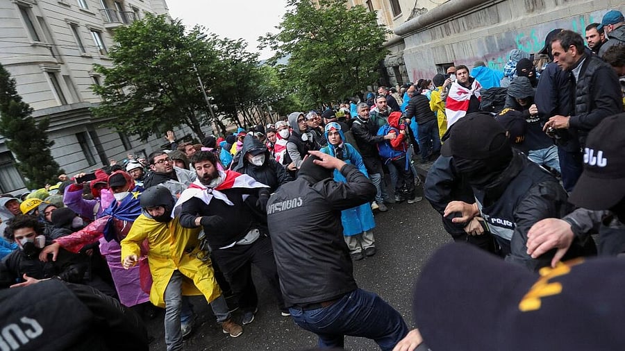 <div class="paragraphs"><p>Demonstrators face off with police officers during a protest against a bill on "foreign agents" in Tbilisi, Georgia, May 13, 2024.</p></div>