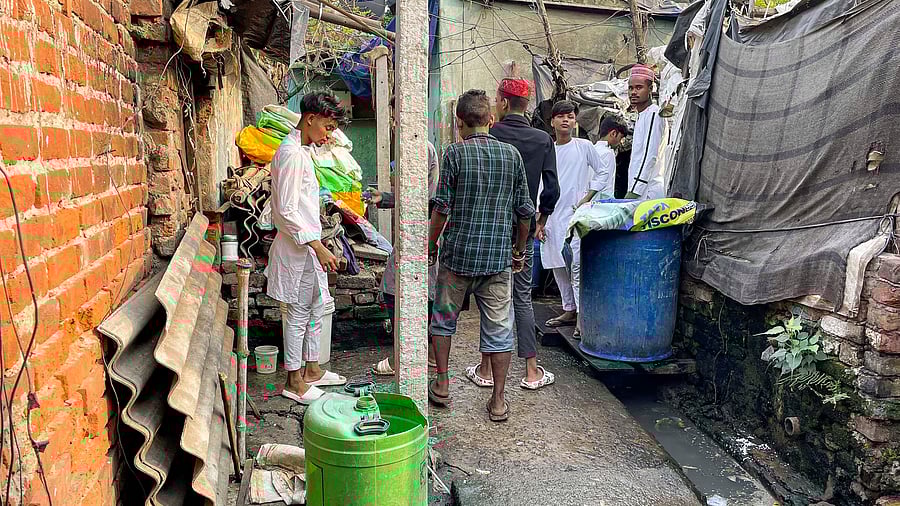 <div class="paragraphs"><p> A clogged drain runs in front of a dwelling at the Kharagpur Gandhi Nagar Bustee. </p></div>