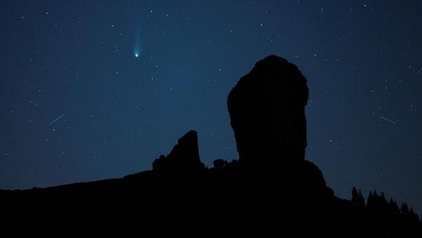 <div class="paragraphs"><p>A comet photographed over the Roque Nublo Natural Monument in Tejeda, on Gran Canaria Island, Spain. Representative image.</p></div>