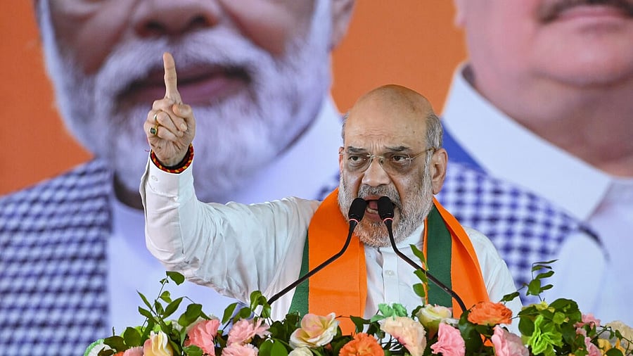 <div class="paragraphs"><p>Union Home Minister Amit Shah speaks during a public meeting for Lok Sabha elections. </p></div>
