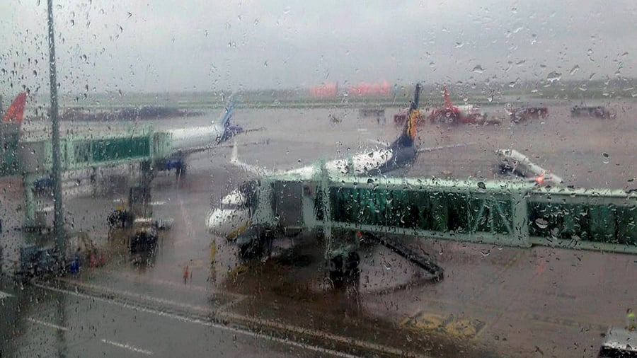 <div class="paragraphs"><p>Aircraft are seen on the tarmac of the Netaji Subhas Chandra Bose International Airport in Kolkata</p></div>