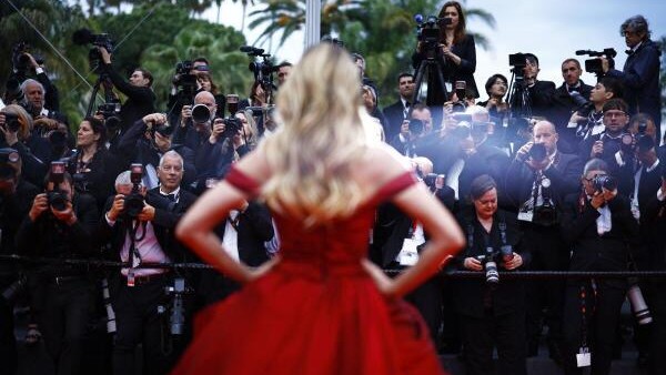 <div class="paragraphs"><p>Photographers take pictures during arrivals at the 77th Cannes Film Festival in Cannes, France.</p></div>