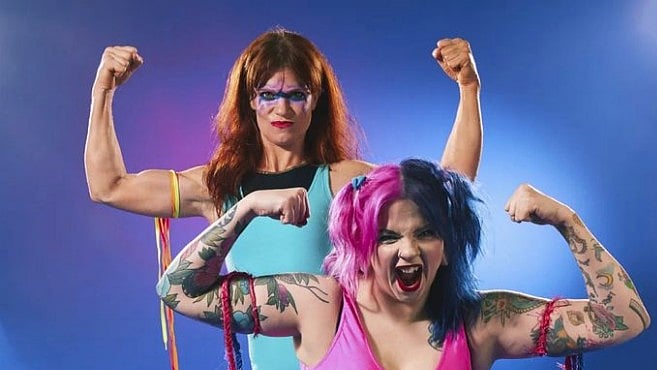 <div class="paragraphs"><p>Several extravagantly tattooed acts laugh and pose in the dressing room as they put the finishing touches to their wigs, paint on pencil moustaches, and add glitter where necessary.</p></div>