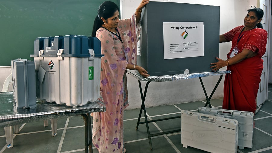 <div class="paragraphs"><p>Polling officials prepare a polling booth, a day before voting in the fourth phase of Lok Sabha elections, in Hyderabad, Sunday.</p></div>