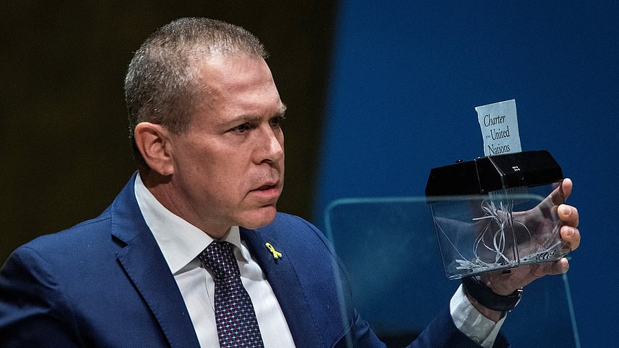 <div class="paragraphs"><p>Israel's Ambassador to the United Nations Gilad Erdan destroys with a machine a piece of paper with the title of the United Nations Charter as he addresses delegates during the United Nations General Assembly before voting on a draft resolution that would recognize the Palestinians as qualified to become a full UN member, in New York City, US, May 10, 2024. </p></div>