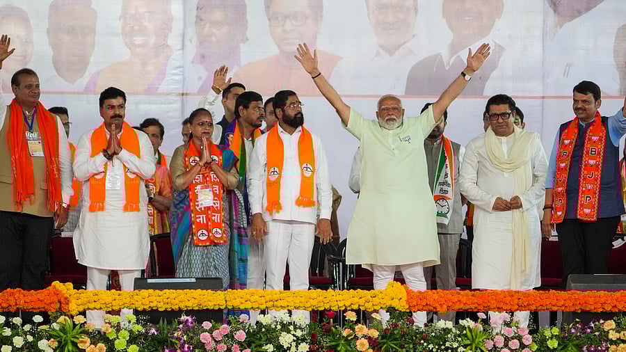 <div class="paragraphs"><p>Mumbai: Prime Minister Narendra Modi with Maharashtra Chief Minister Eknath Shinde, Deputy Chief Minister Devendra Fadnavis and Maharashtra Navnirman Sena (MNS) chief Raj Thackeray during a rally for Lok Sabha elections, in Mumbai, Friday, May 17, 2024. </p></div>