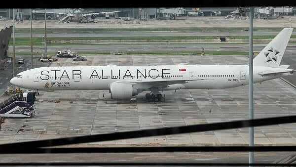 <div class="paragraphs"><p>Singapore Airlines aircraft for flight SQ321 is parked on the tarmac after an emergency landing at Suvarnabhumi International Airport.</p></div>