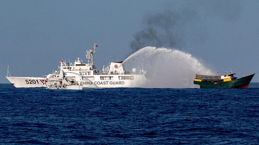 <div class="paragraphs"><p>Chinese Coast Guard vessels fire water cannons towards a Philippine resupply vessel Unaizah on May 4 as it made its way to the Second Thomas Shoal in the South China Sea.</p></div>
