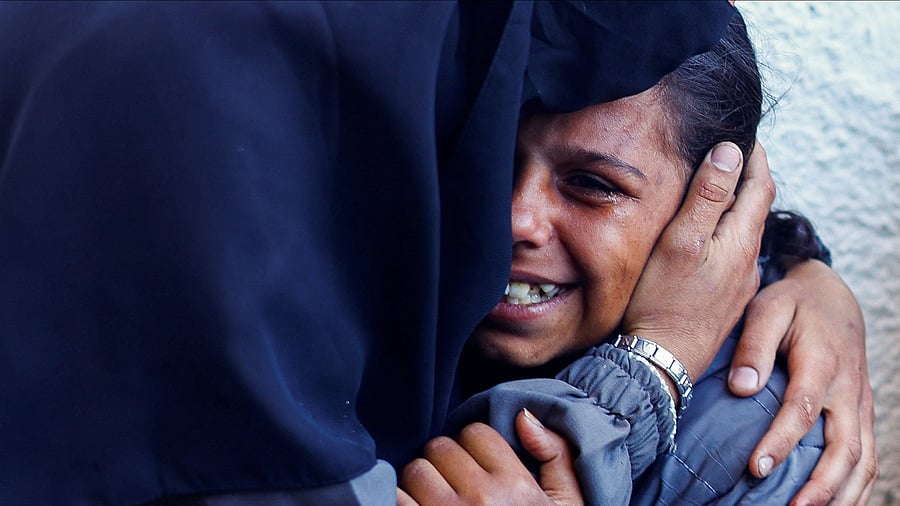 <div class="paragraphs"><p>A child mourns Palestinians killed in Israeli strikes, amid the ongoing conflict between Israel and the Palestinian Islamist group Hamas, in Rafah, in the southern Gaza Strip.</p></div>