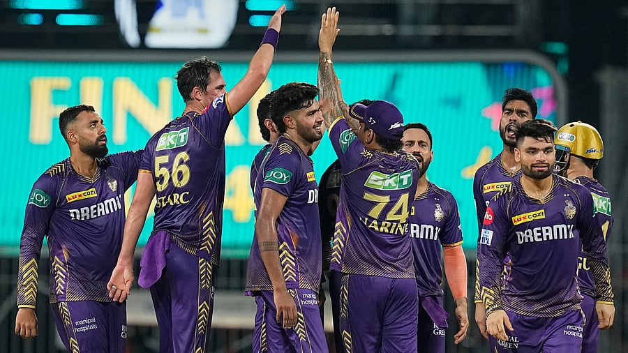 <div class="paragraphs"><p>Kolkata Knight Riders' Varun Chakravarthy with teammates celebrates the wicket of Sunrisers Hyderabad batter Shahbaz Ahmed during IPL final.</p></div>