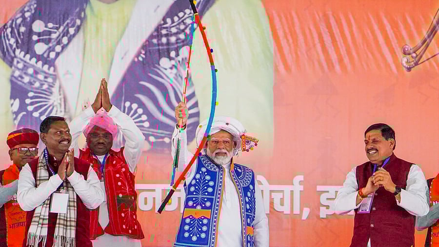<div class="paragraphs"><p>Prime Minister Narendra Modi with Tribal Affairs Minister Arjun Munda, Madhya Pradesh Chief Minister Mohan Yadav and others during the 'Janjatiya Sammelan' in Jhabua, Madhya Pradesh, Sunday.</p></div>