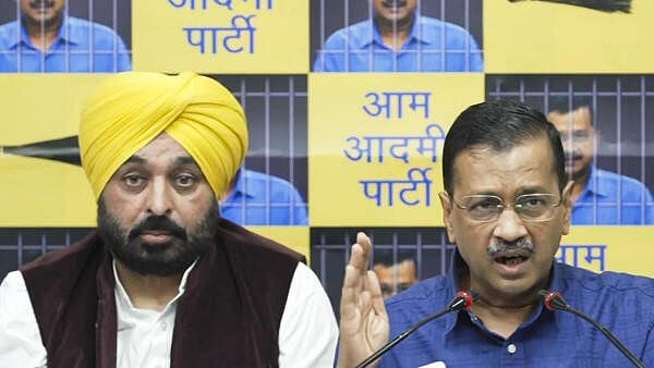 <div class="paragraphs"><p>Delhi Chief Minister and AAP convenor Arvind Kejriwal with Punjab Chief Minister Bhagwant Mann addresses a press conference, in New Delhi, Sunday, May 12, 2024.</p></div>