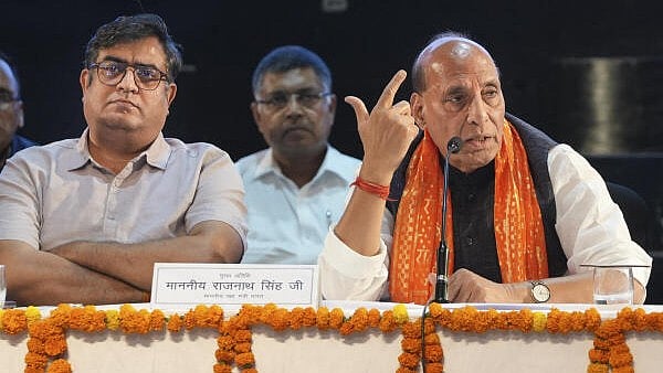 <div class="paragraphs"><p>Union Defence Minister Rajnath Singh with others during an election seminar amid the ongoing Lok Sabha polls.</p></div>