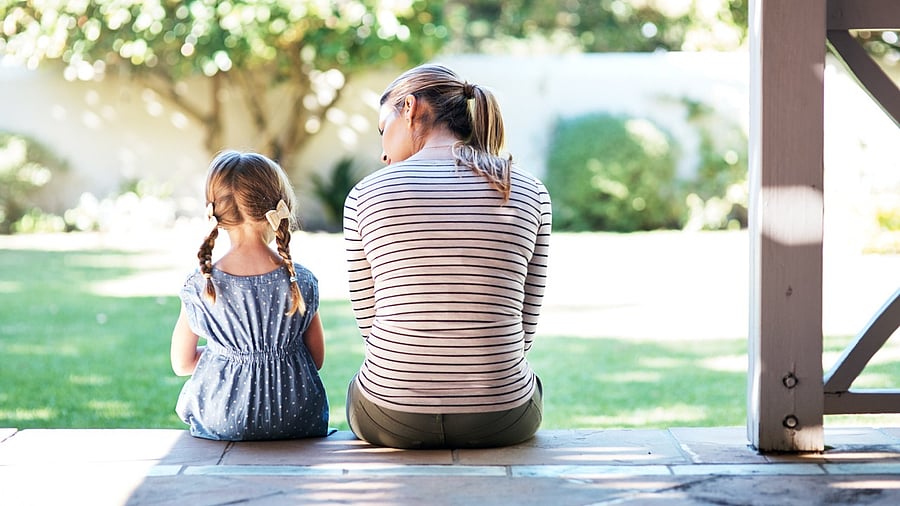 <div class="paragraphs"><p>Representative image of a young woman and her daughter having a conversation on the porch. </p></div>