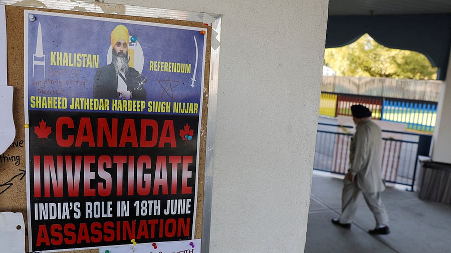 <div class="paragraphs"><p>A sign asking for an investigation into India's alleged role in the killing of Sikh leader Hardeep Singh Nijjar is seen at the Guru Nanak Sikh Gurdwara temple, in Surrey, British Columbia, Canada.</p></div>