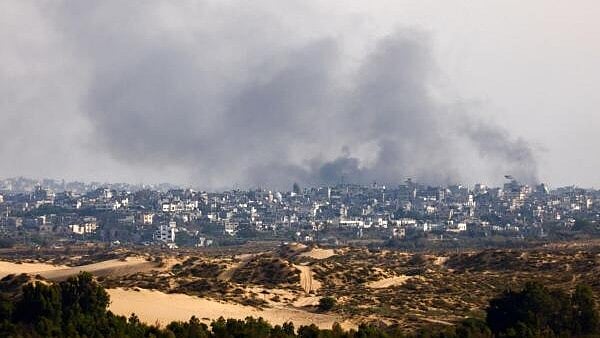 <div class="paragraphs"><p>Smoke rises following an Israeli airstrike in Gaza, amid the ongoing conflict between Israel and the Palestinian Islamist group Hamas.</p></div>