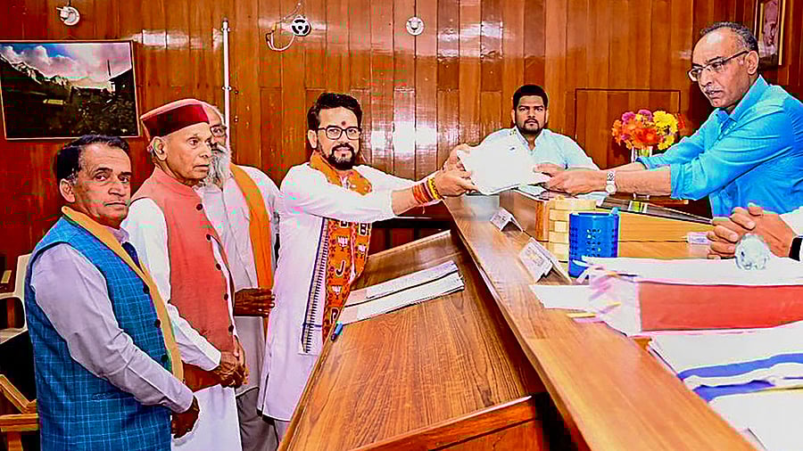 <div class="paragraphs"><p>Union Minister and BJP candidate Anurag Thakur files his nomination papers to contest election from Hamirpur Lok Sabha, in Hamirpur.</p></div>