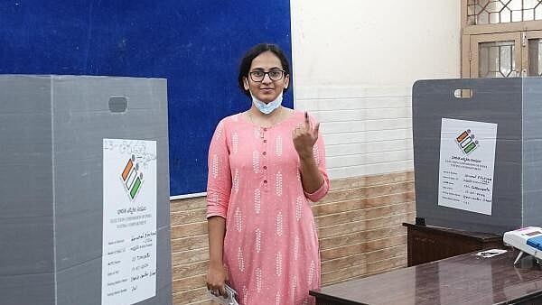<div class="paragraphs"><p>A woman shows her finger marked with indelible ink after casting her vote at a polling station during the fourth phase of Lok Sabha elections and Andhra Pradesh Assembly elections, at Sullurupeta in Tirupati district.</p></div>