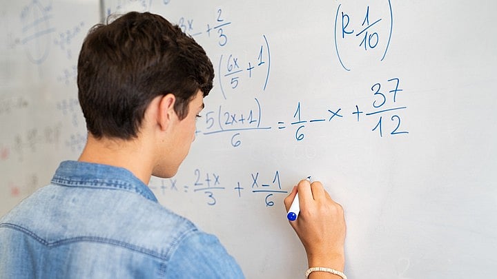 <div class="paragraphs"><p>Representative image of a student practicing algebra.</p></div>