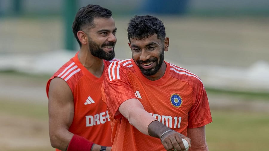 <div class="paragraphs"><p>Jasprit Bumrah and Virat Kohli during a practice session</p></div>