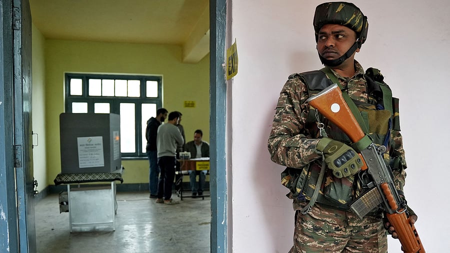 <div class="paragraphs"><p>n Indian security force personnel stands guard outside a polling booth during the fourth phase of India's general election in Srinagar.</p></div>