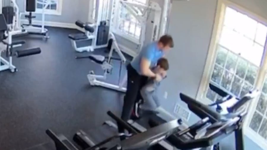 <div class="paragraphs"><p>Screengrab from a video showing the man forcing his son to run on a treadmill despite the latter's struggles.</p></div>