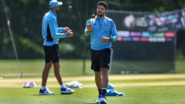 <div class="paragraphs"><p>Cricketer Umesh Yadav at a practice session.</p></div>