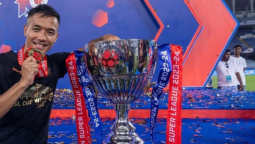 <div class="paragraphs"><p>Mumbai City FC's&nbsp;Lallianzuala Chhangte with the 2023-24 ISL Trophy.</p></div>