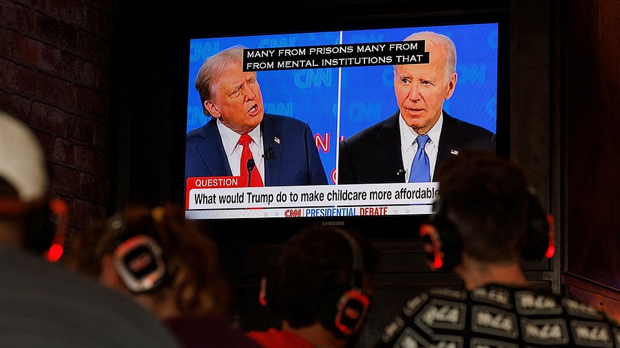 <div class="paragraphs"><p>People watch the first Presidential debate between US President Joe Biden and Republican candidate, former President Donald Trump.</p></div>