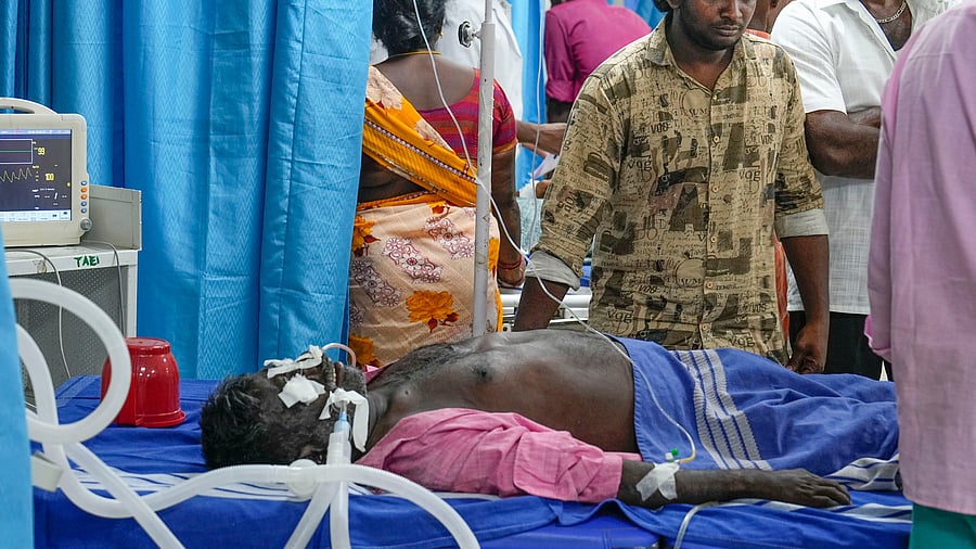 <div class="paragraphs"><p>Kallakurichi: Family members stand next to patients admitted to a government hospital after consuming spurious liquor, in Kallakurichi, Friday, June 21, 2024. </p></div>