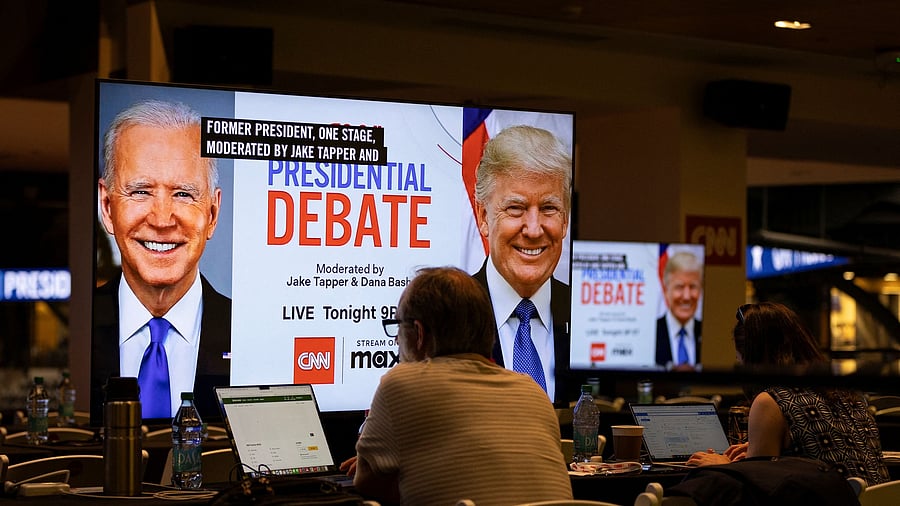 <div class="paragraphs"><p>Media crews work at the press room in the McCamish Pavilion on the Georgia Institute of Technology campus ahead of the first 2024 presidential debate between Democratic presidential candidate US President Joe Biden and Republican presidential candidate former US President Donald Trump in Atlanta, Georgia, US, June 27, 2024. </p></div>