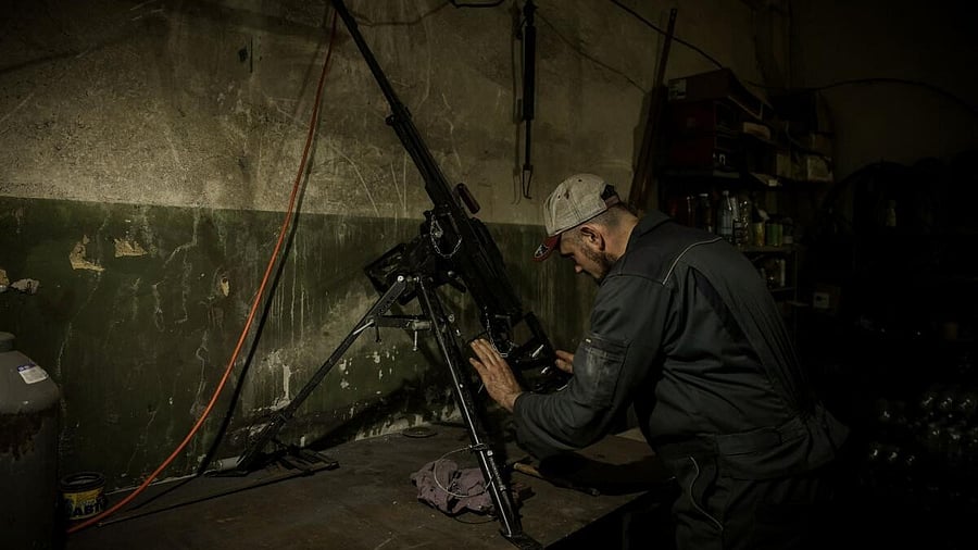 <div class="paragraphs"><p>A Ukrainian serviceman of a repair and restoration battalion of the 24th Separate Mechanized Brigade of the Ukrainian Armed Forces named after King Danylo, repairs a machine gun at a workshop, amid Russia's attack on Ukraine, in an undisclosed location, Ukraine June 18, 2024.</p></div>