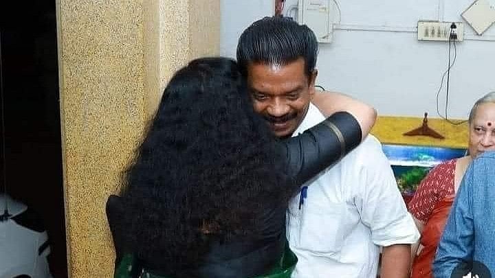 <div class="paragraphs"><p>IAS officer Divya S Iyer hugging CPM senior leader K Radhakrishnan.</p></div>