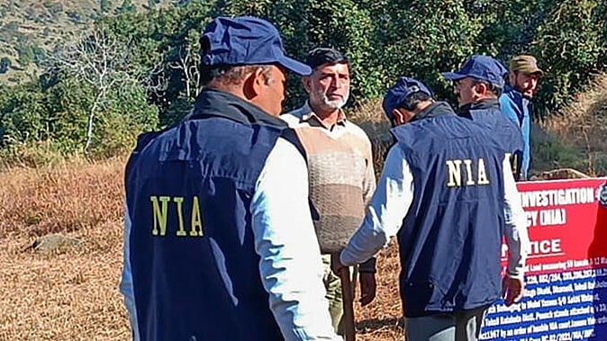 <div class="paragraphs"><p>NIA officials during a search operation. (Representative file image)</p></div>