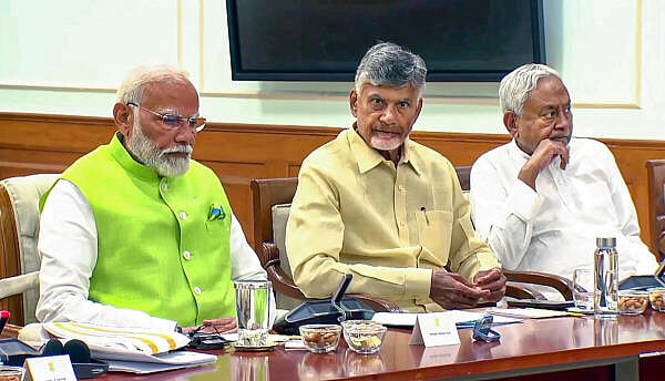 <div class="paragraphs"><p>Prime Minister Narendra Modi with key allies TDP chief N Chandrababu Naidu and JD(U) chief Nitish Kumar (L-R).</p></div>