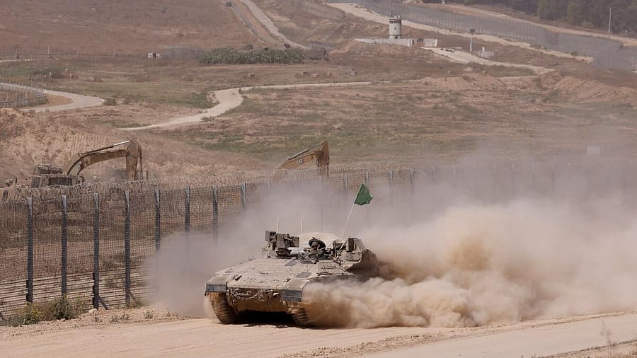<div class="paragraphs"><p>Israeli tank manoeuvres near the Israel-Gaza border, amid the ongoing conflict between Israel and Hamas, in Israel, June 8, 2024</p></div>