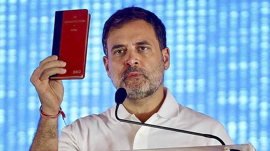 <div class="paragraphs"><p>Congress leader Rahul Gandhi holding coat pocket edition of the Constitution.</p></div>