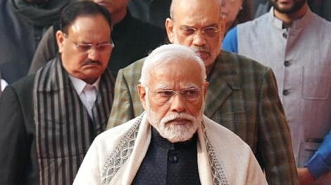 <div class="paragraphs"><p>PM Narendra Modi is seen here with BJP leaders Amit Shah and J P Nadda in the background</p></div>