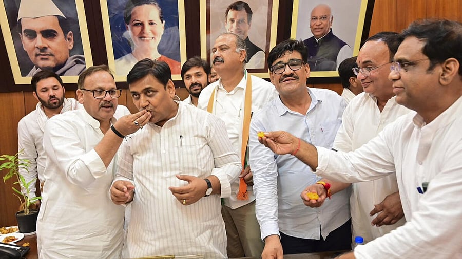 <div class="paragraphs"><p>Rajasthan Congress chief Govind Singh Dotasra with party leader celebrates their gain in Lok Sabha polls during counting of votes, in Jaipur.&nbsp;</p></div>