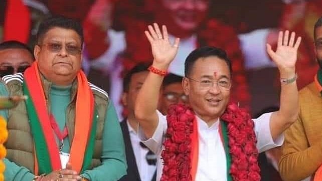 <div class="paragraphs"><p>(L to R) Two-time SKM legislator Sanjeet Kharel with Sikkim CM Prem Singh Tamang.</p></div>