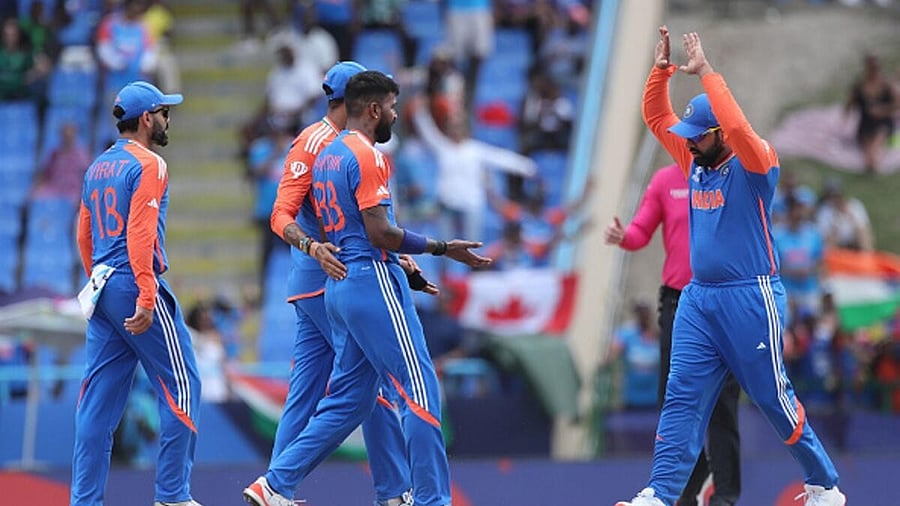 <div class="paragraphs"><p>India's bowler Hardik Pandya with captain Rohit Sharma during the ICC Men's T20 World Cup cricket match.</p></div>