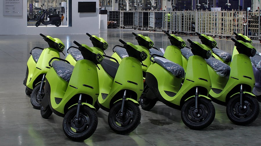 <div class="paragraphs"><p> Ola Electric's S1 Air e-scooters are pictured inside its manufacturing facility in Pochampalli, Tamil Nadu.</p></div>
