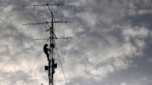 <div class="paragraphs"><p>Representative image showing a man climbing a mobile tower.</p></div>