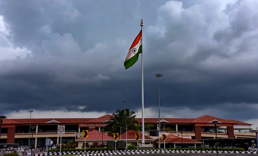 <div class="paragraphs"><p>The Indian national flag waves amid cloud cover over the Cochin International Airport, in Kochi. </p></div>