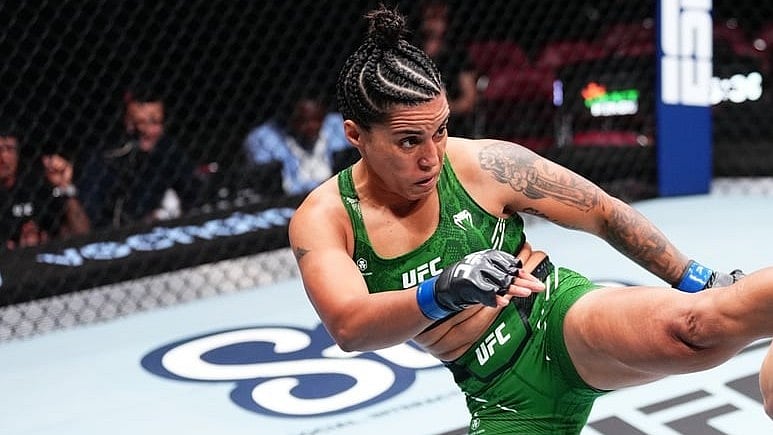 <div class="paragraphs"><p>An image of Indian MMA fighter Puja Tomar.</p></div>