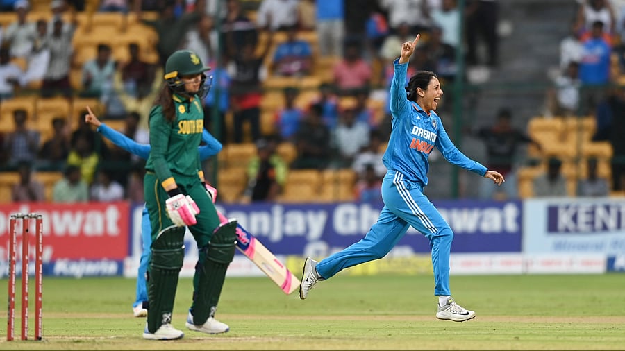 <div class="paragraphs"><p>Smriti Mandhana celebrates after claiming her maiden ODI wicket during India's four-run win in the second ODI against South Africa at the M Chinnaswamy stadium in Bengaluru on Wednesday. </p></div>